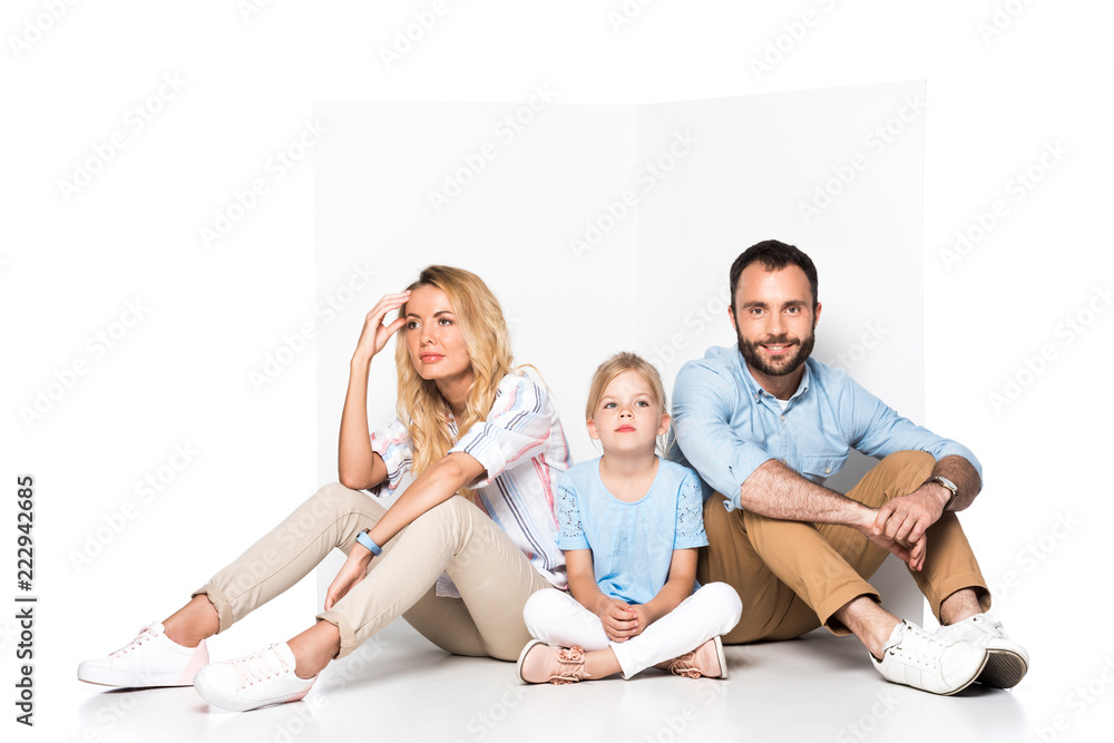 family sitting on floor isolated on white family sitting on floor isolated on white