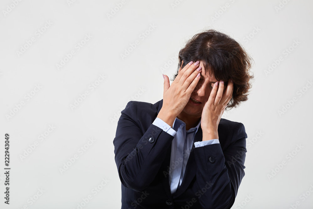 Senior businesswoman with migraine Senior businesswoman with migraine