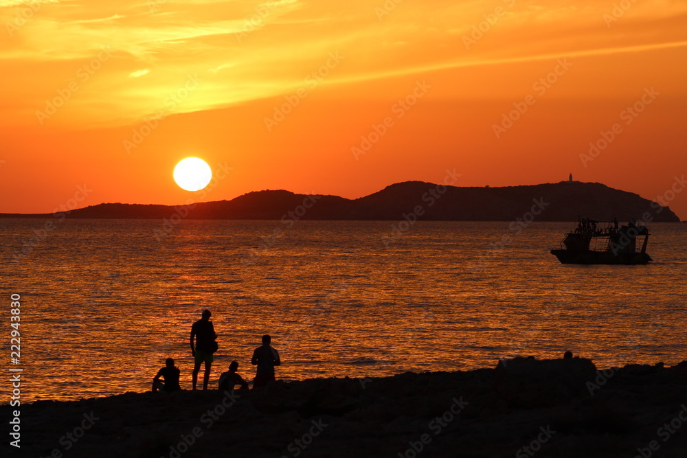 ibiza sunset with group of friends silhouette ibiza sunset with group of friends silhouette