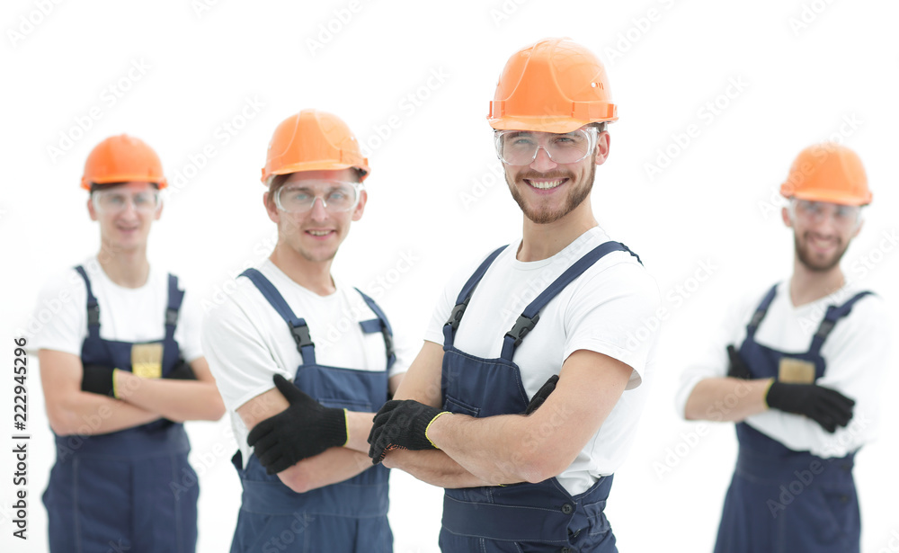 smiling team of construction workers . smiling team of construction workers .