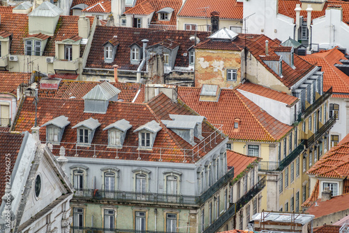 Lisbon run-down roofs long shot view with different colors