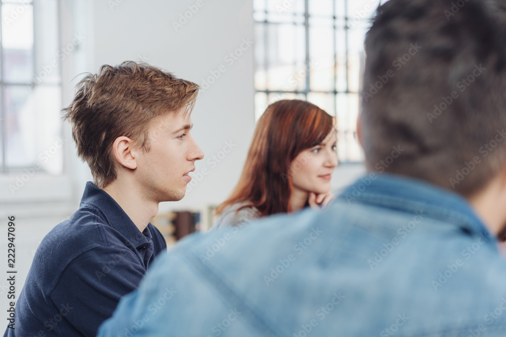 Young businessman or student in a meeting Young businessman or student in a meeting