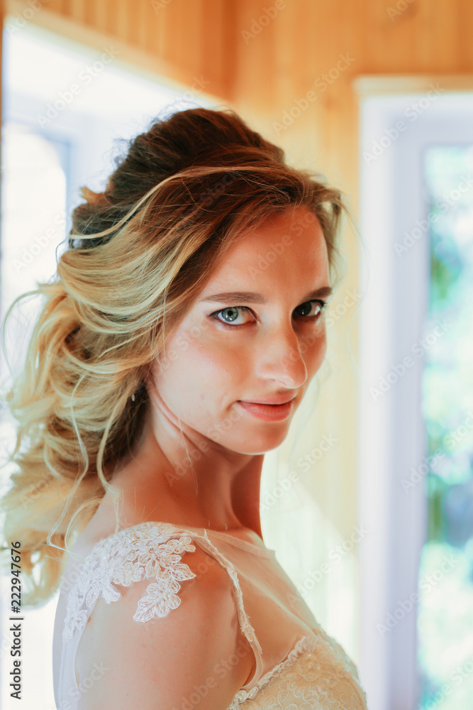 Beautiful young bride on blurred color background Beautiful young bride on blurred color background