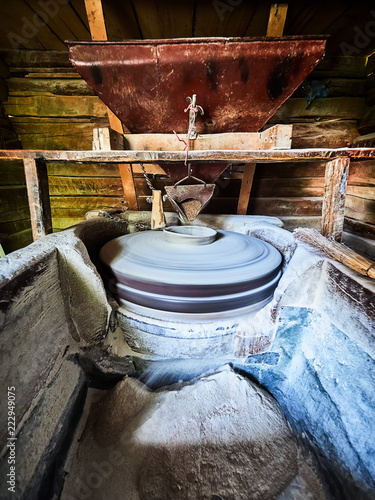 Traditional water mill for grinding wheat to make flour for baking bread in Eftimie Murgu, Romania
 photo