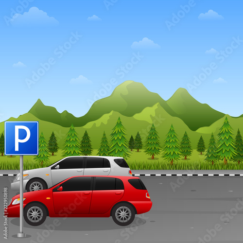 Mountains landscape with parking zone sign and two car