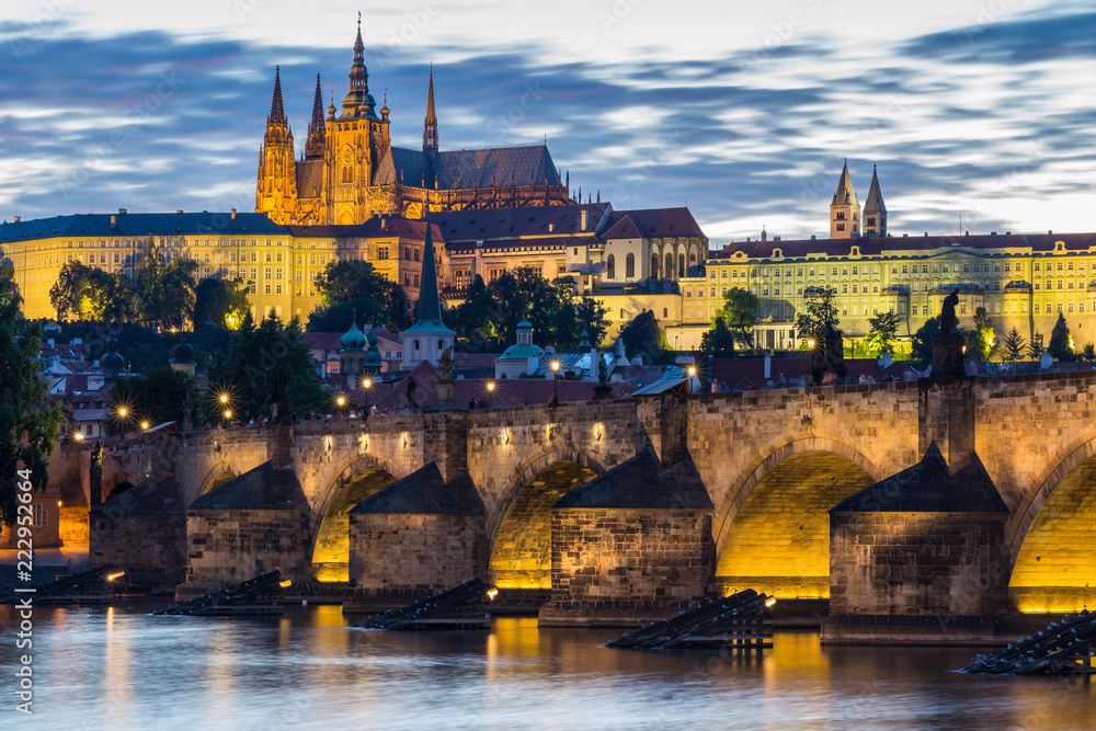 Famous iconic image of Prague castle and Charles Bridge, Prague, Czech Republic. Concept of world travel, sightseeing and tourism.