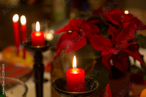 Poinsettia with candles