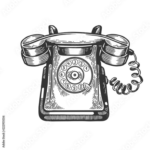 Old rotary dial phone engraving vector illustration. Scratch board style imitation. Black and white hand drawn image.