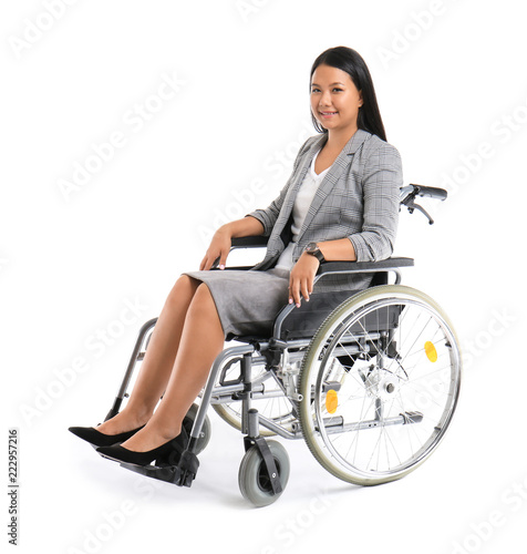 Asian woman in wheelchair o...
