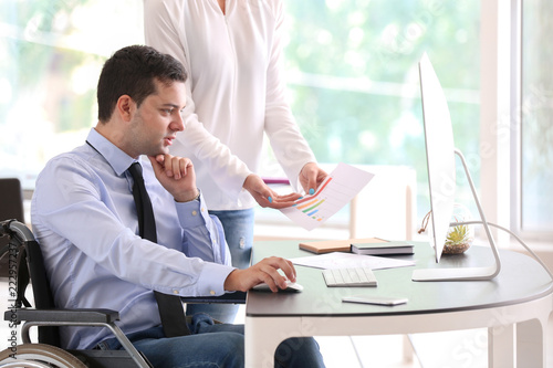 Businessman in wheelchair w...