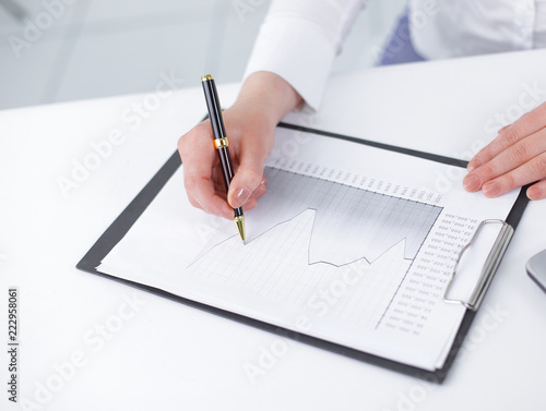 business woman analyzing the financial schedule