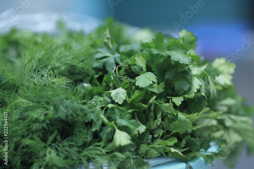 close up.the background image of sprigs of dill and parsley