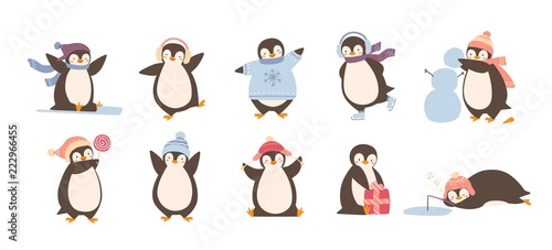 Photo Bundle of adorable penguins wearing winter clothing and hats isolated on white background