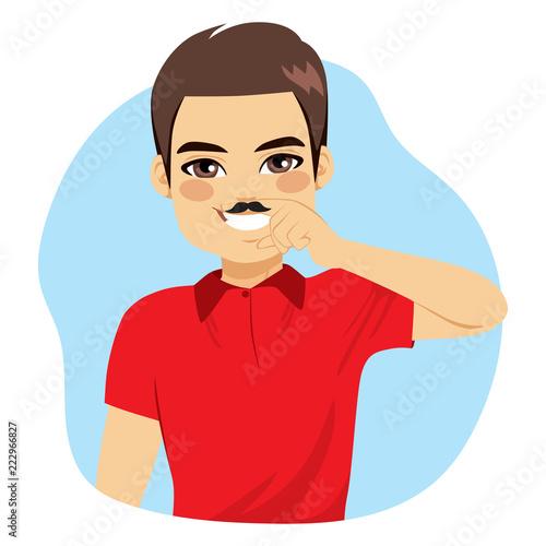 Young man with drawn fake b...
