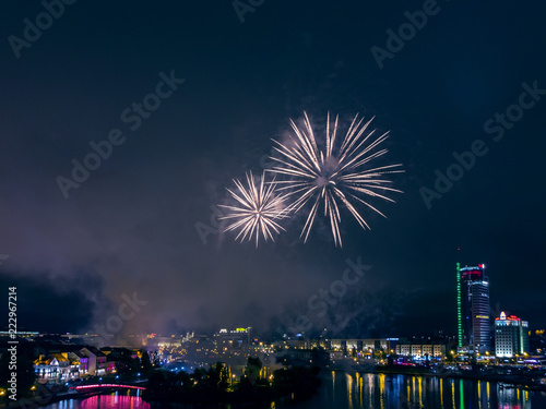 Bright fireworks above Minsk downtown. Beautiful night city panoramic view.  © Mr Twister