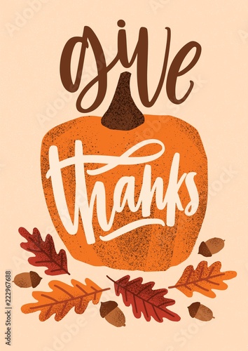 Give Thanks holiday lettering handwritten with cursive font and decorated by seasonal design elements - pumpkin, fallen oak leaves and acorns. Colorful vector illustration for Thanksgiving day.