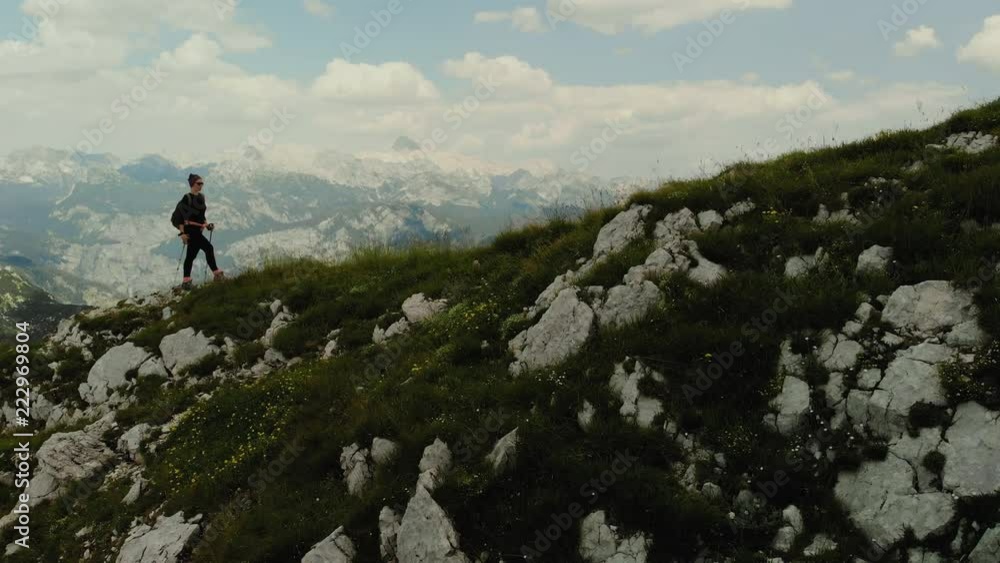 Woman hiker on top of mountain Woman hiker on top of mountain