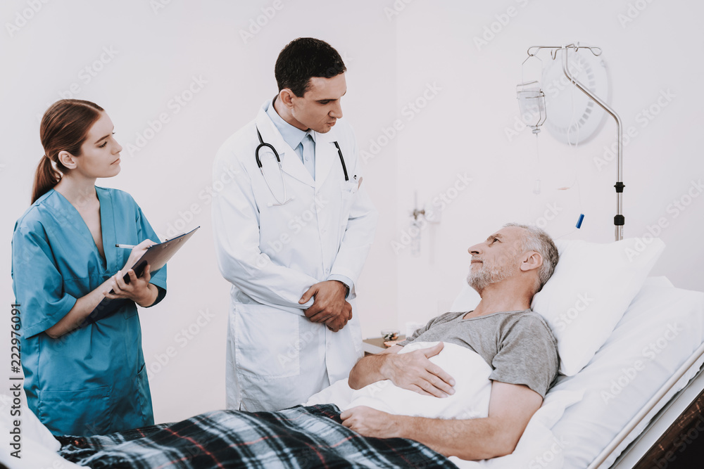 Fototapeta premium The Old Man Lies on a Cot in the Medical Ward.