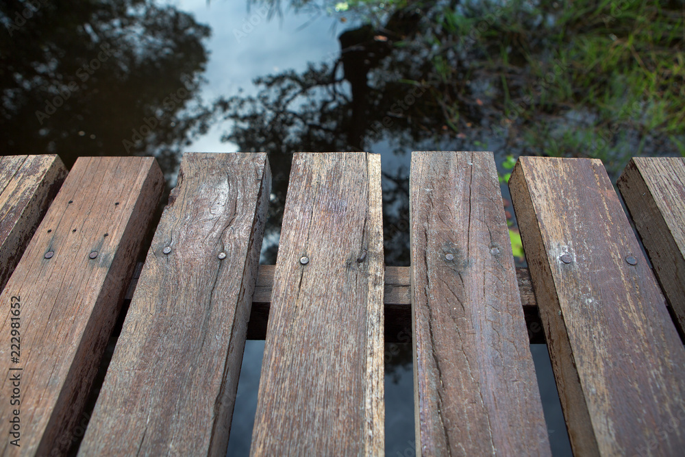 Wood bridge walkway along river Wood bridge walkway along river