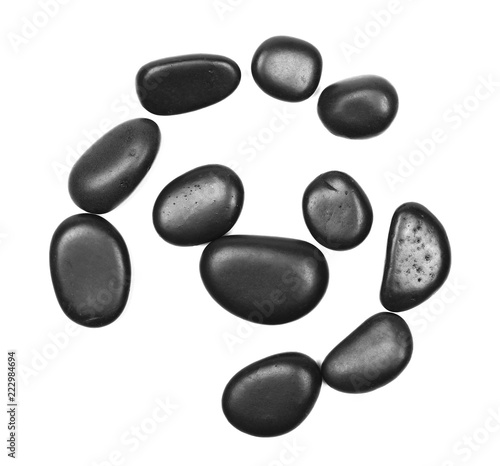 Pile black rocks isolated on white background, top view