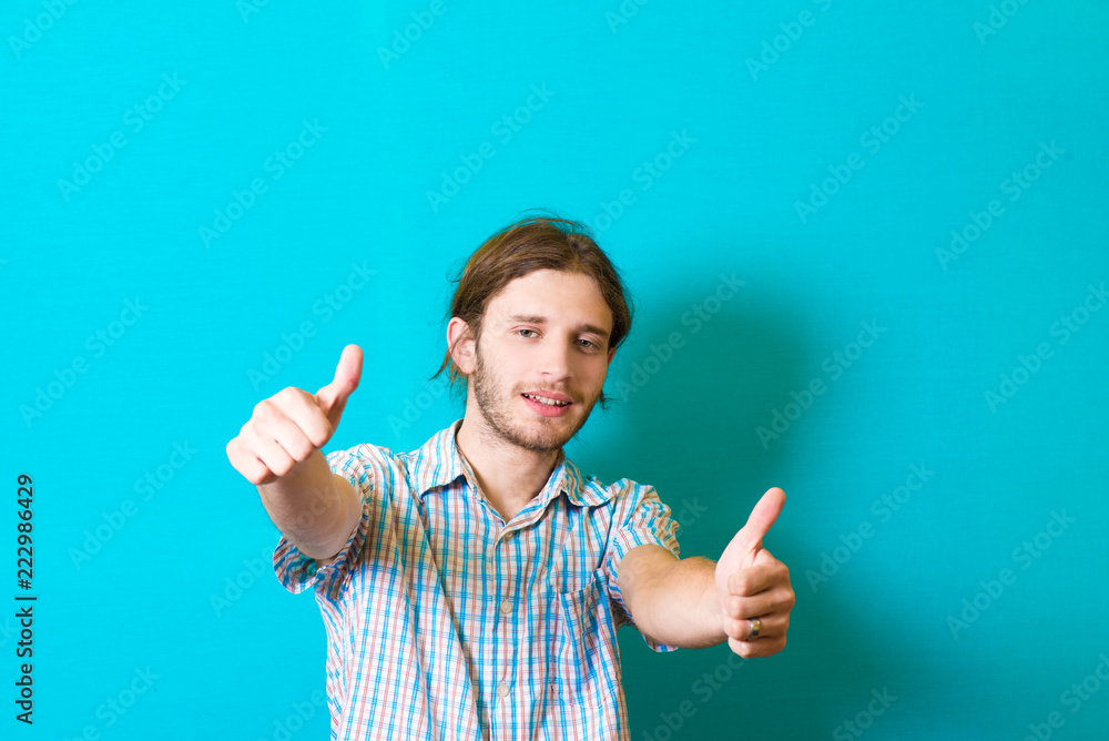 Everything is OK! Happy young man gesturing OK sign and smiling Everything is OK! Happy young man gesturing OK sign and smiling