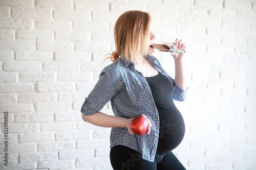 Pregnant young beautiful girl on the ninth month 