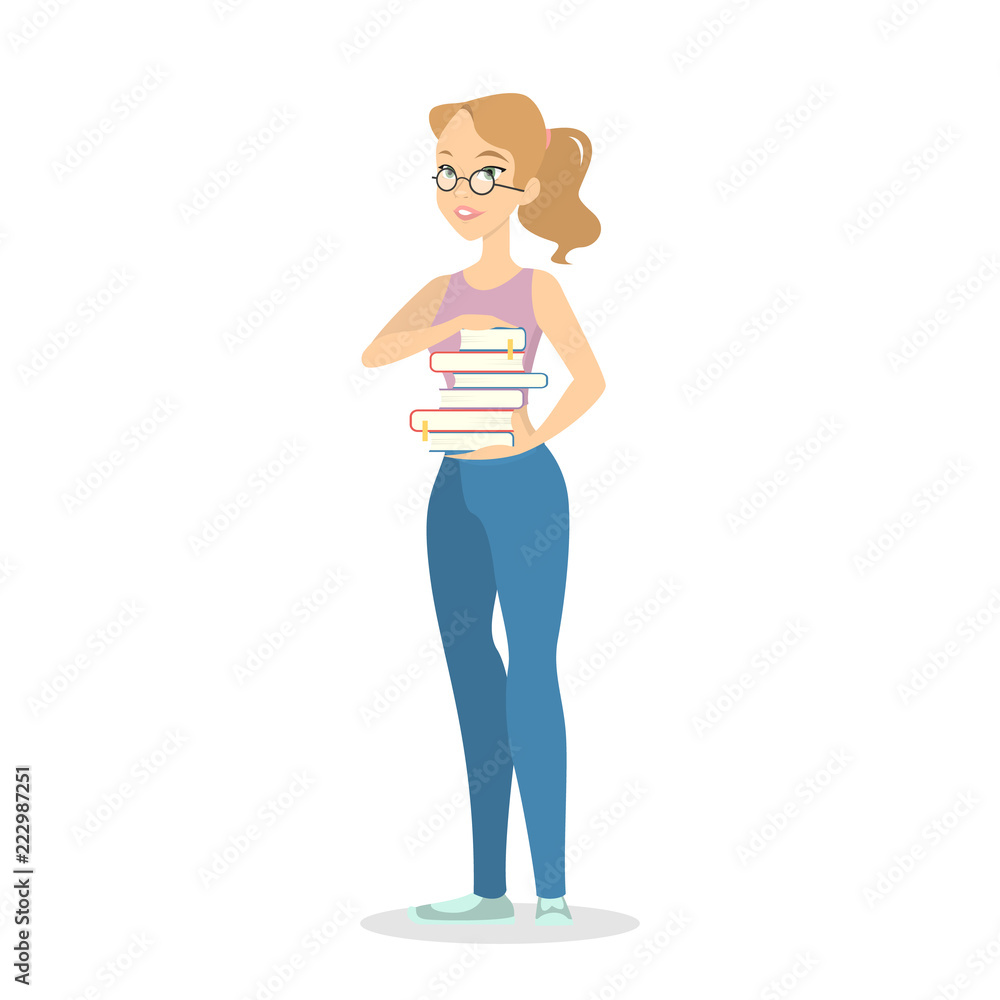 Woman standing and holding stack of books