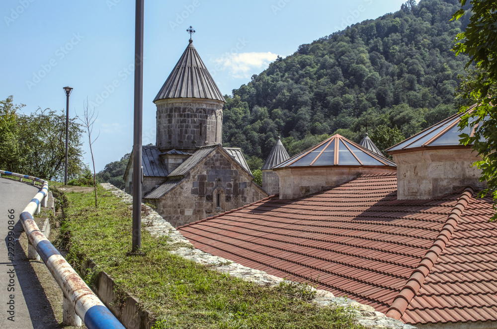 Top view from the road to the new roofs and dome of the Church of Blessed Holy Mother
  of Haghartsin monastery,in the village of gosh,near the town of Dilijan
