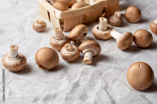 Raw portobello mushrooms on napkin