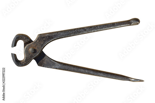 tool old black metal tongs with rust isolated on white background