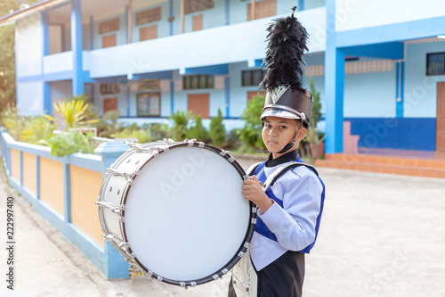 Canvas Print child holding big vintage orchestral drum