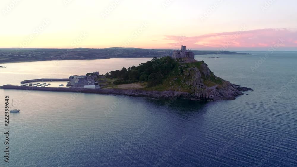 Drone rises besides St Michaels Mount Cornwall at sunrise Drone rises besides St Michaels Mount Cornwall at sunrise