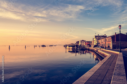 Romantic sunset on the Venice lagoon. Island of Pellestrina.