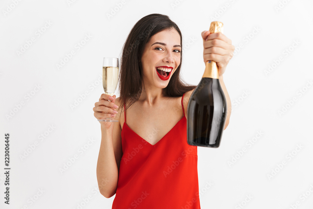 Portrait of a cheerful young woman in dress