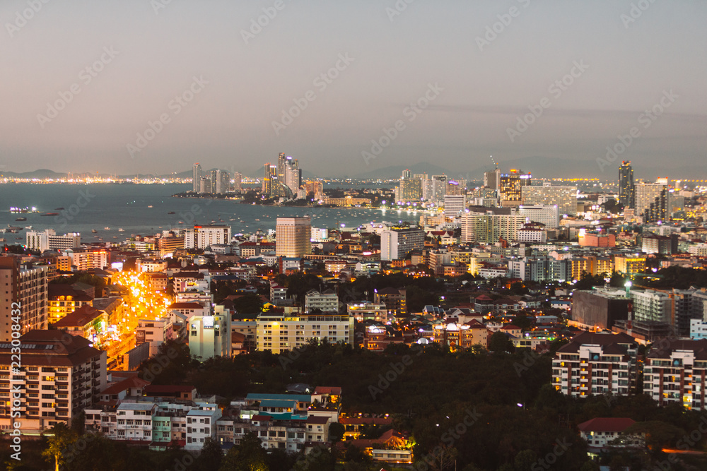 Pattaya cityscape from aerial view. Resort city in Thailand. Asian architecture.