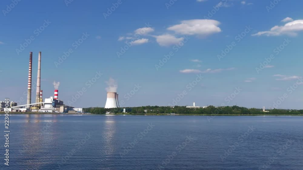 Construction of a large coal-fired power plant. A large cooling tower in the area of a large power plant