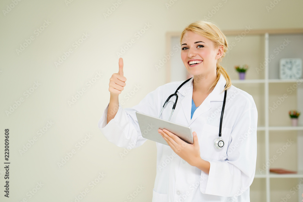 Doctor Woman is smiling and happy. Because she can find information on the care of patients who are hospitalized. The standard is good. Accepted medical treatment in terms of service. Doctor Woman is smiling and happy. Because she can find information on the care of patients who are hospitalized. The standard is good. Accepted medical treatment in terms of service.