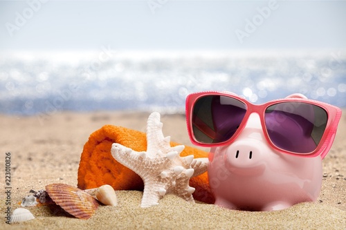 Summer piggy bank with sunglasses