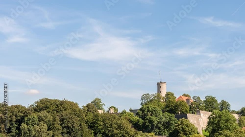 Establishing time lapse shot of the iconic Sparrenburg, the castle dominating the German city of Bielefeld