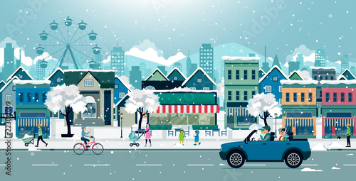 Families are driving snow covered cars in the city.