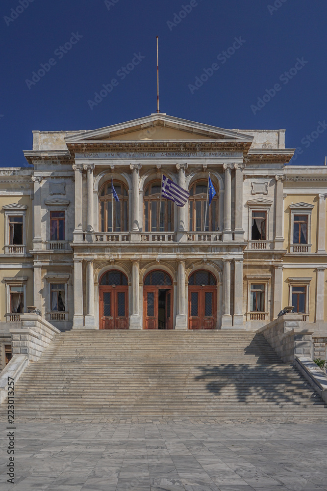 Syros, Greece: The entrance to the Ermoupoli (Hermoupolis) City Hall in Miaouli Square, on the Aegean island of Syros.
