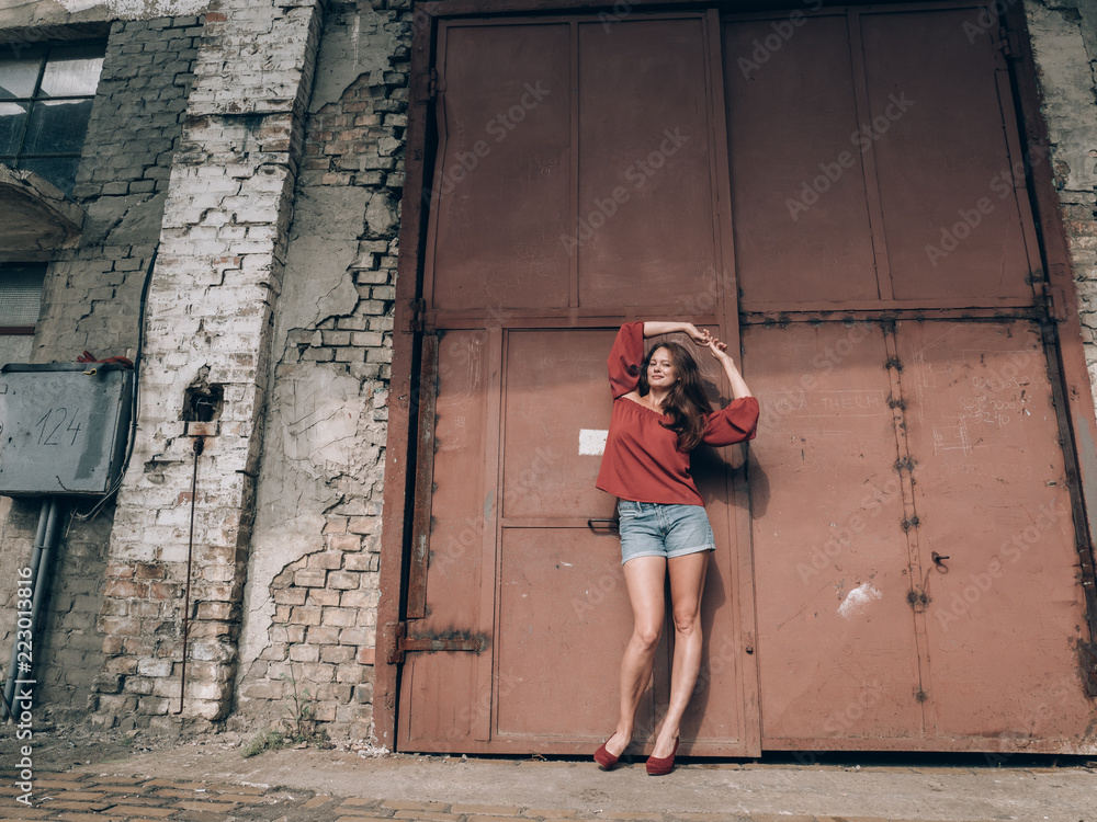 Wide angle shot of beautiful brunette woman.