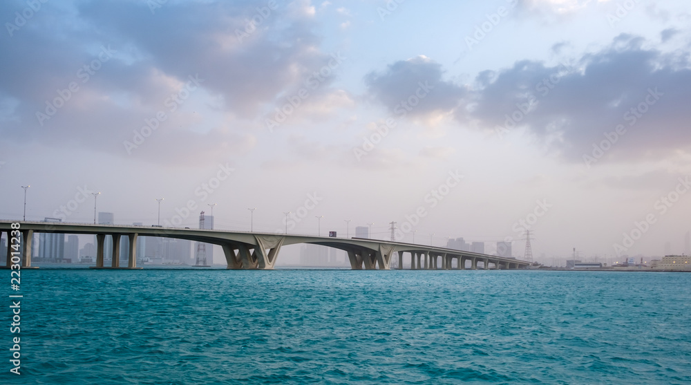 January 21, 2018: Khalifa Bridge against cloudy and misty sky, Abu Dhabi, UAE