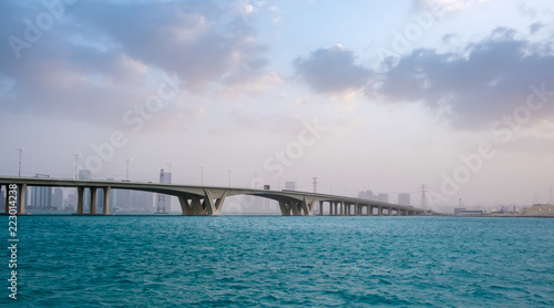 January 21, 2018: Khalifa Bridge against cloudy and misty sky, Abu Dhabi, UAE