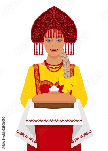 Russian girl in traditional suit with bread and salt