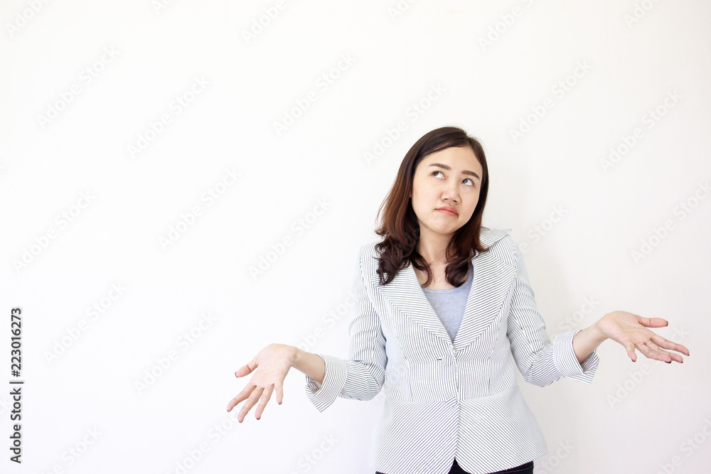 Asian business women in the formal white suit acting on white background. Asian business women in the formal white suit acting on white background.