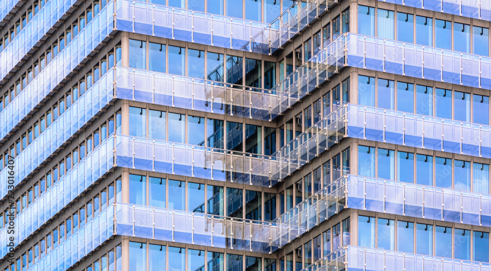 Obraz premium Glass window pattern of a modern office building