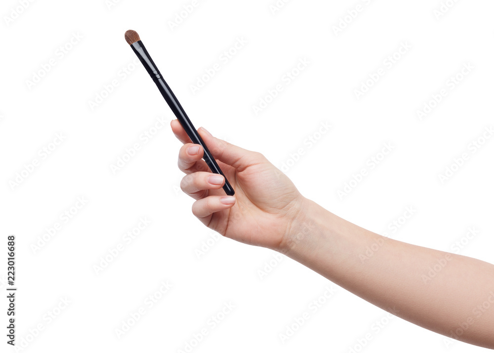 Woman holding brush isolated on white background Woman holding brush isolated on white background