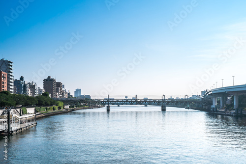 Wallpaper Mural TOKYO, JAPAN - June 22, 2018: Tokyo Railway bridge and blue sky. Torontodigital.ca