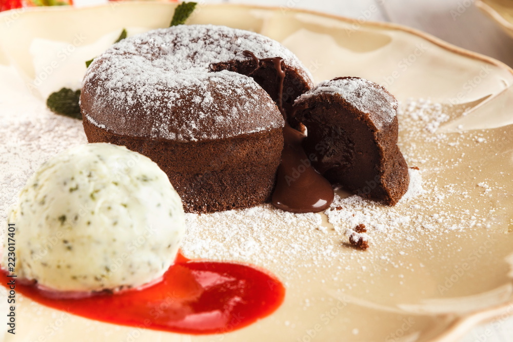 Chocolate fondant with vanilla ice cream and strawberry Chocolate fondant with vanilla ice cream and strawberry